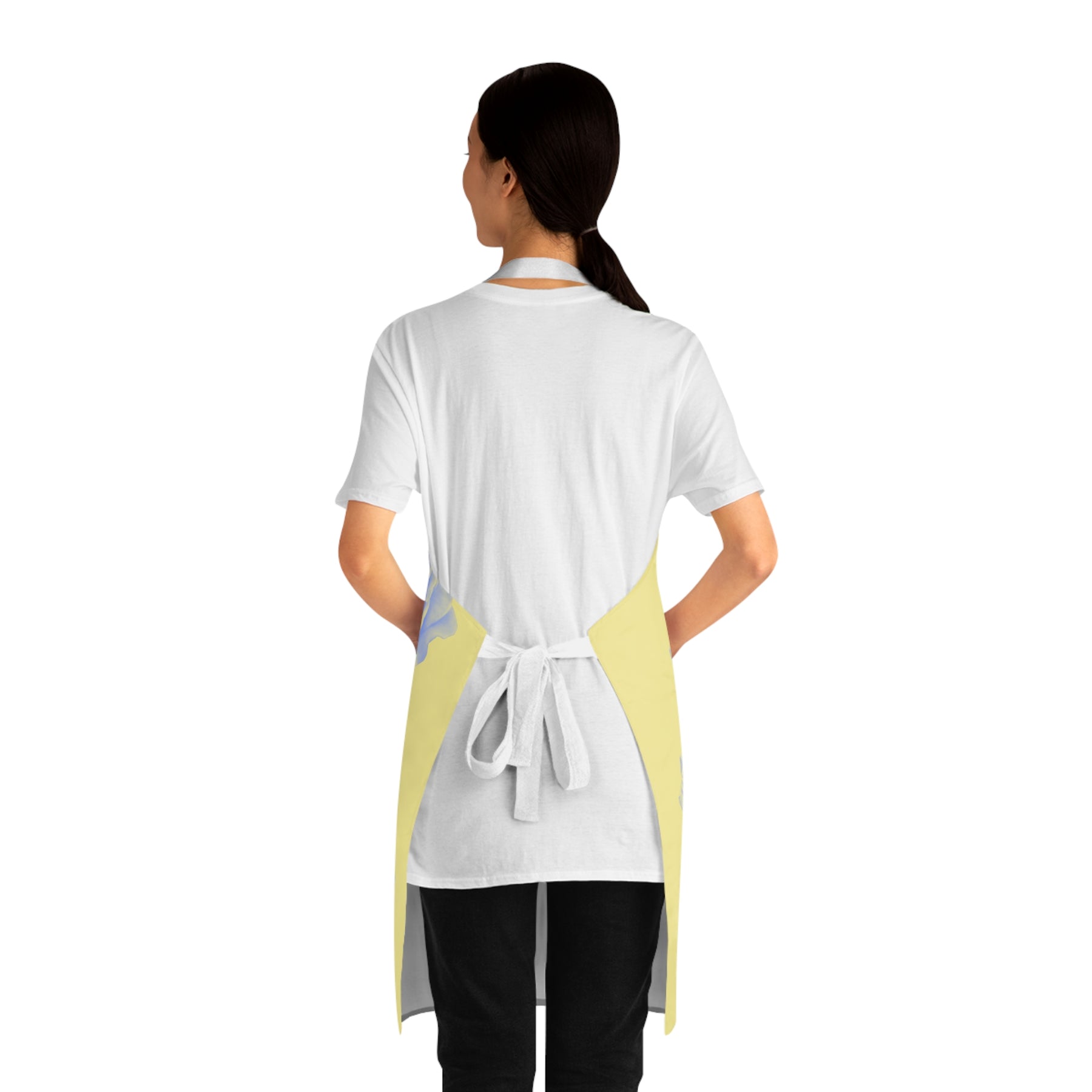 back of girl wearing an apron with white straps tied around waist