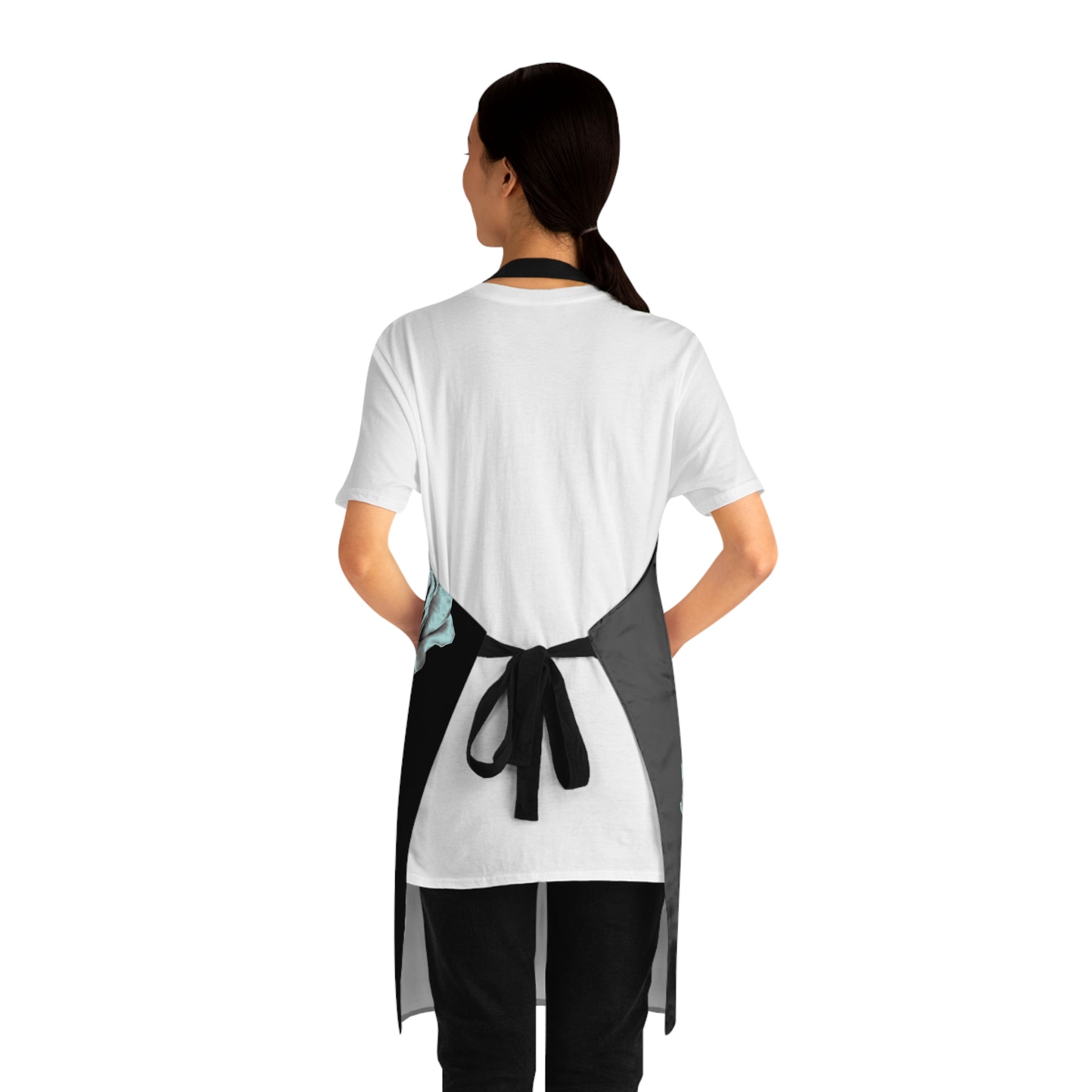 back view of girl wearing an apron with black straps tied at the waist