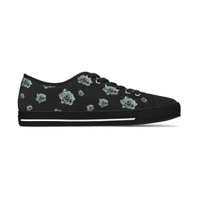 1 Black Sneaker with silver/blue roses and black soles and laces. 