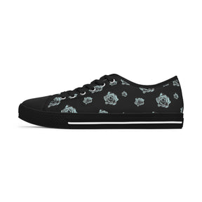 1 Black Sneaker with silver/blue roses and black soles and laces. 