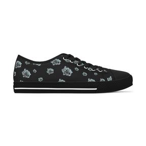 1 Black Sneaker with silver/blue roses and black soles and laces. 