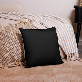 Interior room view with a Premium Pillow with a silver cover with a black back and photo of a budding Lily 