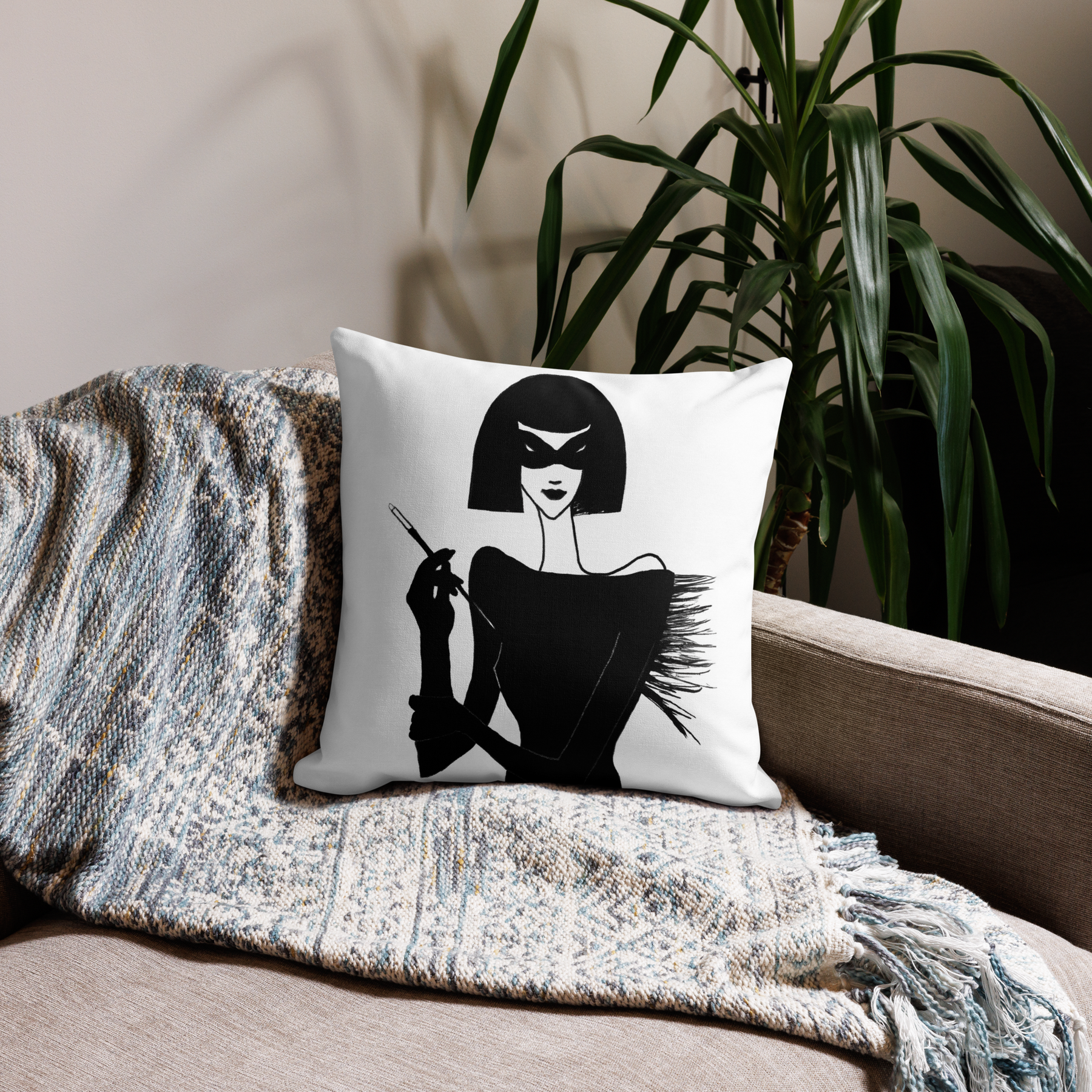 Interior view with a Premium Pillow with an ink drawing of a 1920's woman in a mask and holding a long cigarette