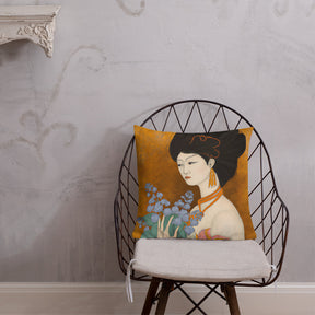 Interior room view of a Premium Pillow with a painted image of a Geisha holding some violets