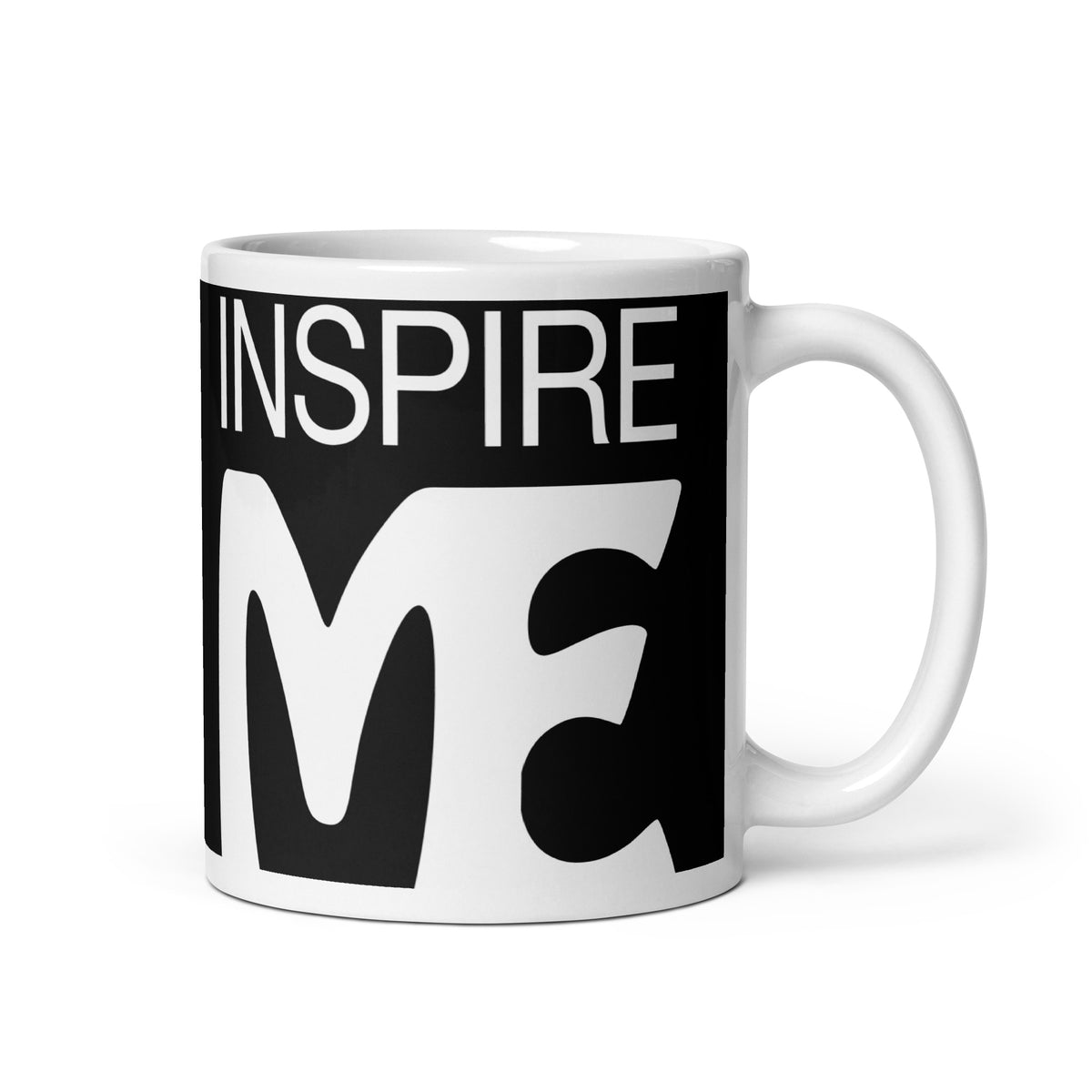 view of a black and white mug that says "inspire me"