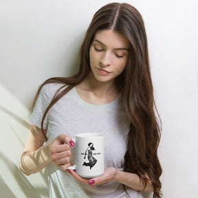 woman holding a Coffee mug with a young woman jumping in the air with the words Got NO Time For You- both the woman and words are black