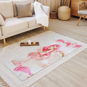 a zen room view with a yoga mat on the floor with a girl in a pink wig with pink flamingos