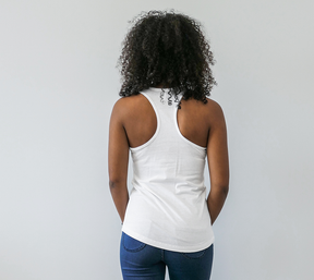 back of girl wearing white racerback  tank top