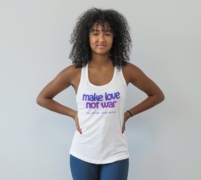 girl wearing white tank top that says "make love not war. oh, and art... make art too"